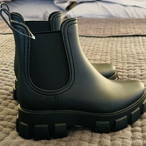 Jeffrey Campbell. Size 8. Black rubber boots.